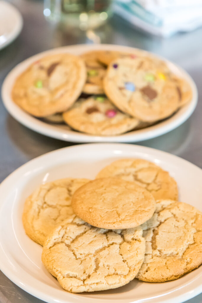 Two plates of freshly baked cookies
