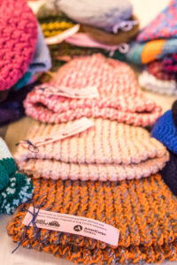 Stacks of knitted hats